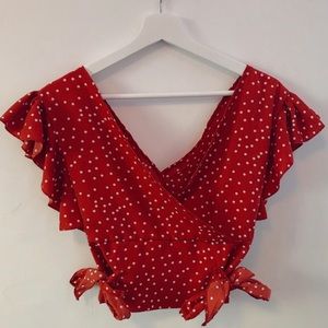 Red blouse with white polka dots